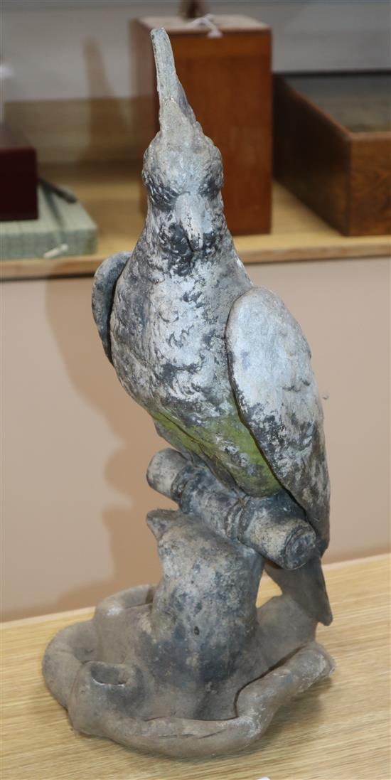 A lead garden ornament modelled as a parrot height 42cm